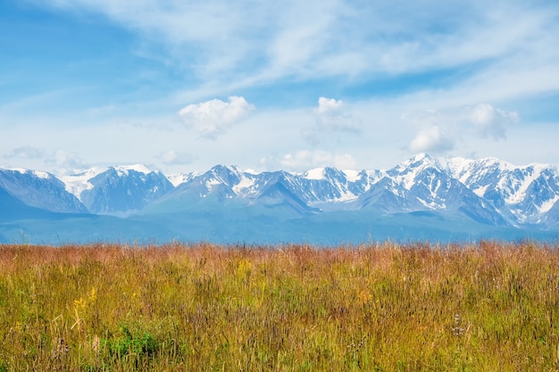 Background of agricultural field and mountains. Sky with mountains in the background.