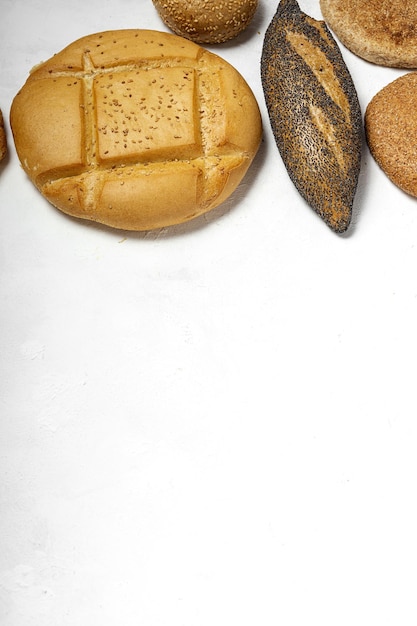 Background of assorted breads from above Bakery food Healthy food concept flat lay