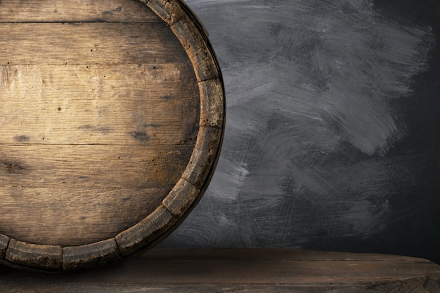 Background of barrel and worn old table of wood