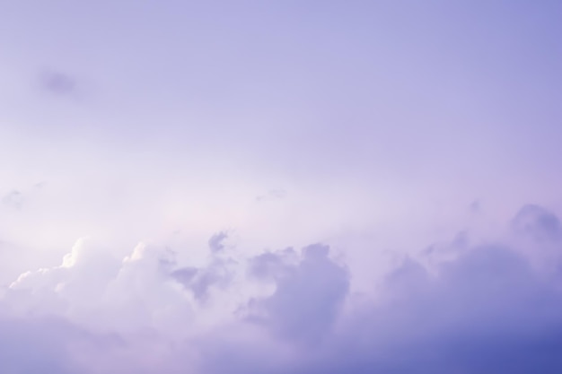 Background of a beautiful pink and pale purple sky with clouds at sunset. high quality photo