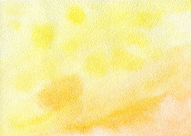 Background beautiful yellow stains of watercolor paint