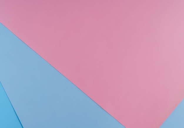 Sfondo di carta blu e rosa con motivo geometrico di colori pastello