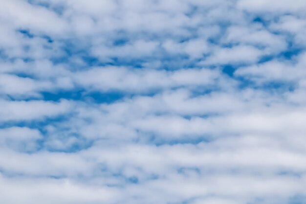 Background of blue sky with white clouds