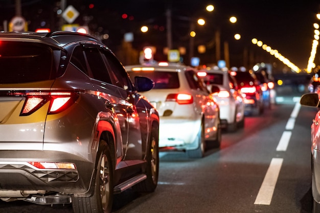 Background blur out of focus bokeh traffic jams road repairs or\
accidents red brake lights of stopped cars