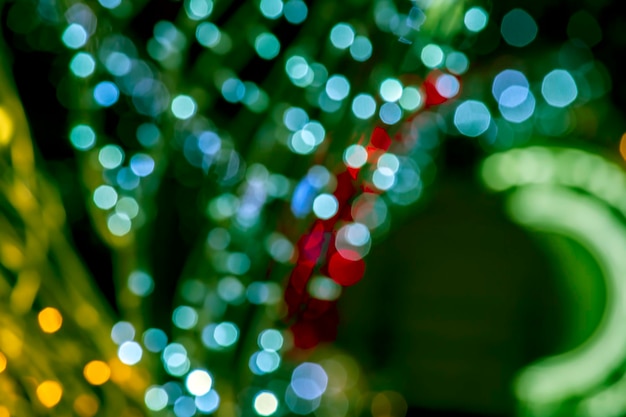 background blurred abstraction of colored lanterns and decorations. bokeh texture of street colored lights