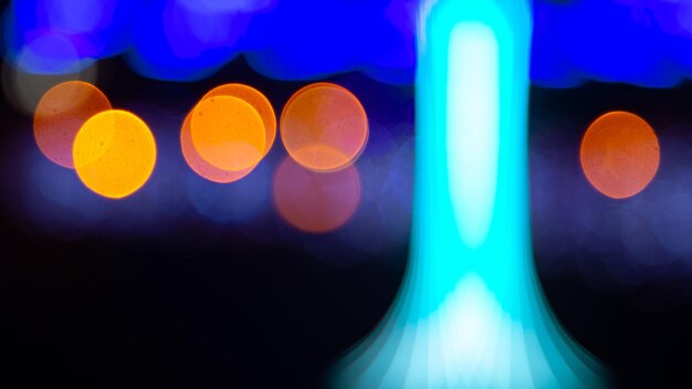 Foto sfondo sfocato astrazione di lanterne colorate e decorazioni bokeh texture di luci colorate di strada