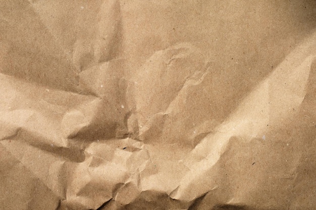 Background of brown wrapping crumpled paper. close-up