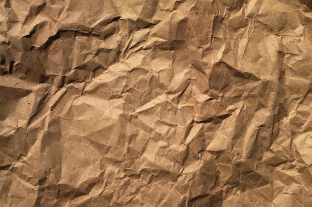 Background of brown wrapping crumpled paper. close-up