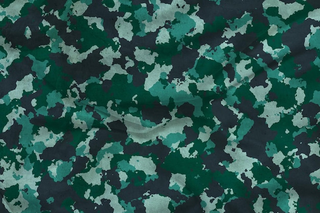 a background of camouflage with a green and grey background