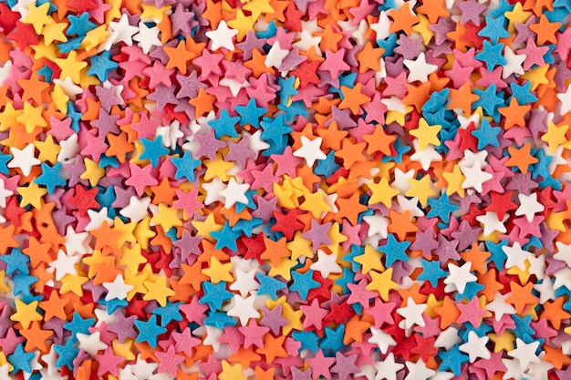 background of colored pastry stars