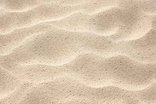 Foto sfondo per il design sul tema della località balneare. modello naturale astratto. trama di sabbia sulla spiaggia