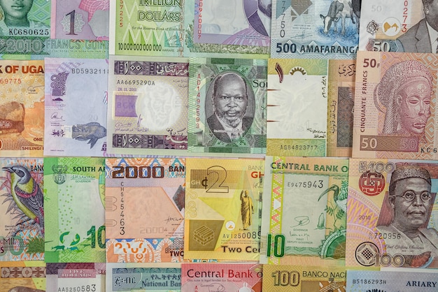 Background of different banknotes of African notes that are spread all over the table