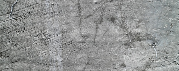 白いコンクリートの壁の背景汚い抽象的なグランジテクスチャ