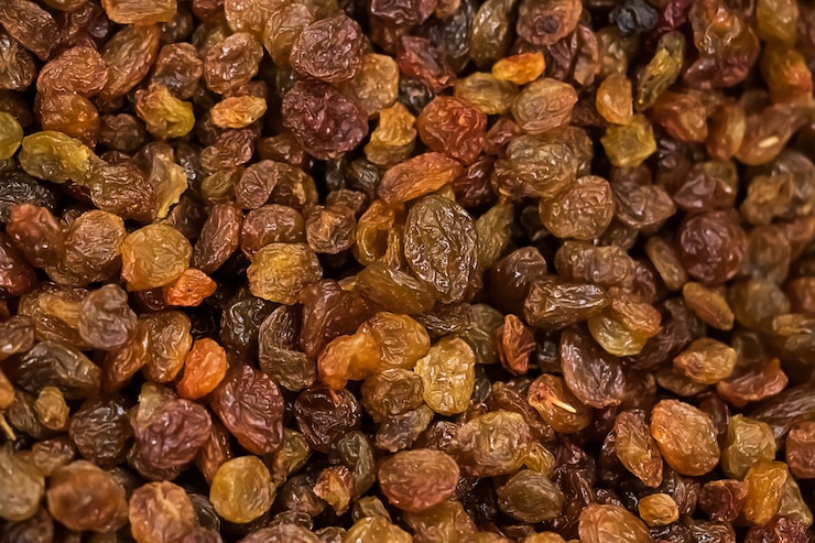 Photo background of dried raisins. vegetarian sweets for diet food.