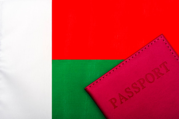 On the background of the flag of Madagascar is a passport