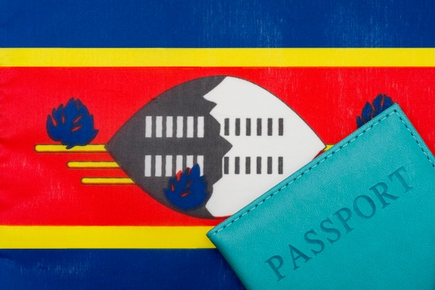 Photo on the background of the flag of swaziland is a passport