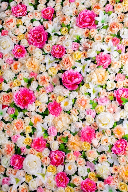 Background Flowers. Panoramic of artificial flowers. delicate palette, bright, multi-colored, rich color