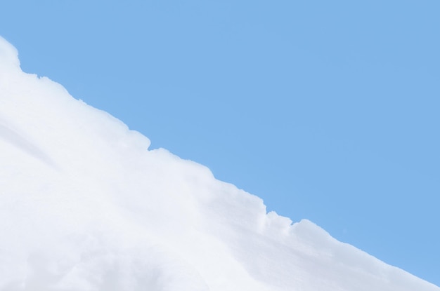 Background of fresh snow texture in blue tone