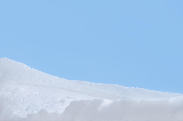 Background of fresh snow texture in blue tone