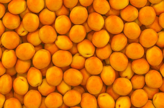 Background from apricots top view 3D rendering