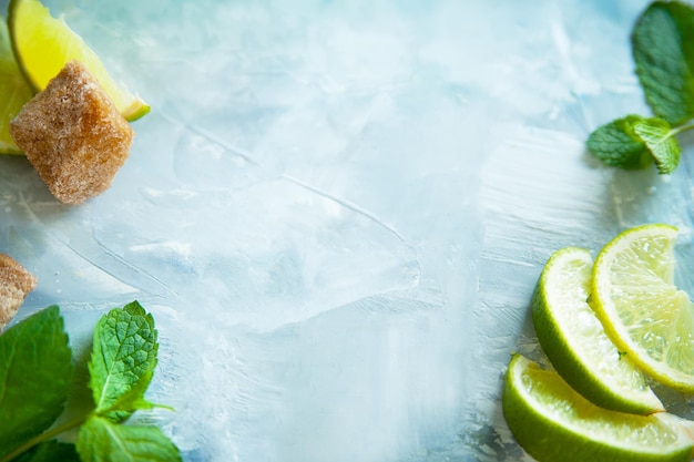 Photo background from ingredients for mojito lime crushed cane sugar mint