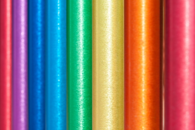 Photo background from multi-colored steel pipes.