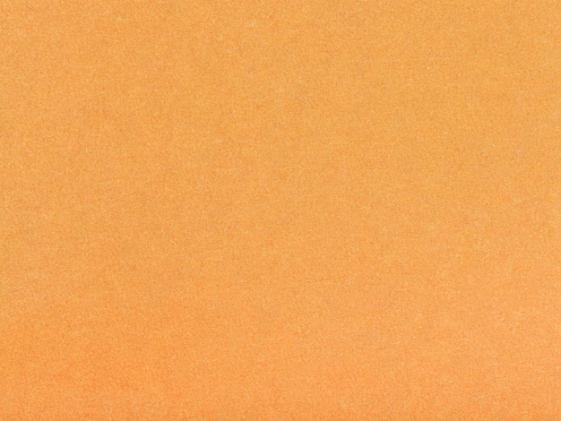 Photo background from orange brown pastel paper