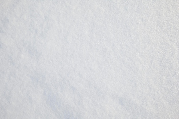 Foto sfondo di neve. primo piano bianco del fondo della neve.