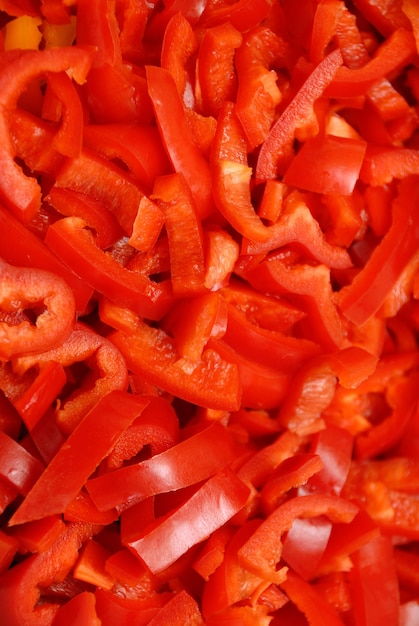 Фото Фон из нарезанного свежего перца красного цвета