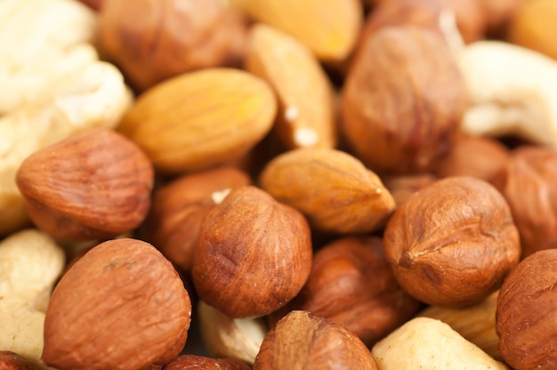 Background from various kinds of nuts (almond, hazelnut, cashew, Brazil nut)