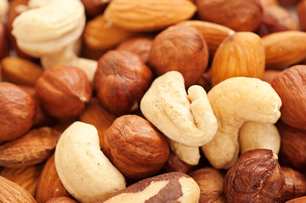 Background from various kinds of nuts (almond, hazelnut, cashew, Brazil nut)