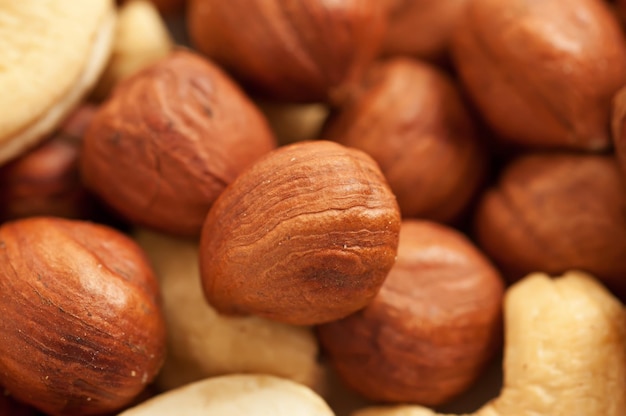 Background from various kinds of nuts almond hazelnut cashew Brazil nut