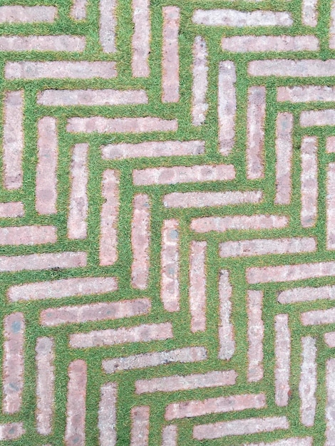 background of geometric shapes made of grass and bricks