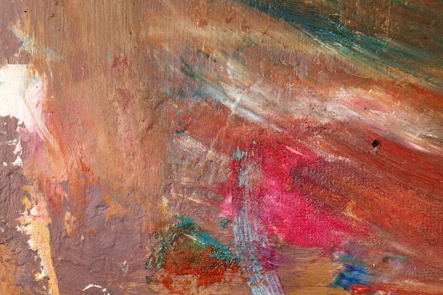 Background image of bright oilpaint palette closeup