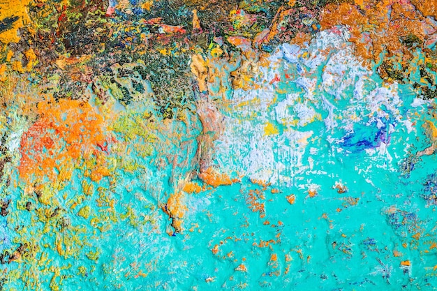 Background image of bright oilpaint palette closeup