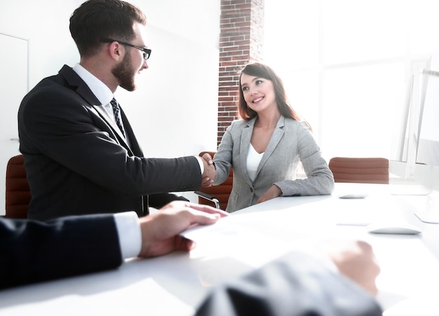 Background image handshake of business partners