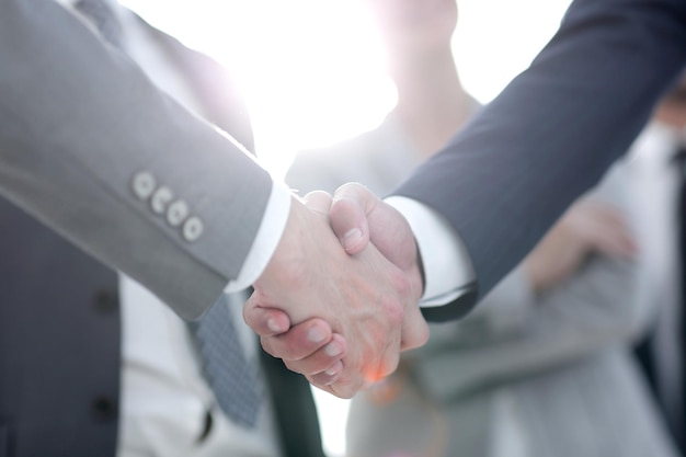 Background image of handshake of business people