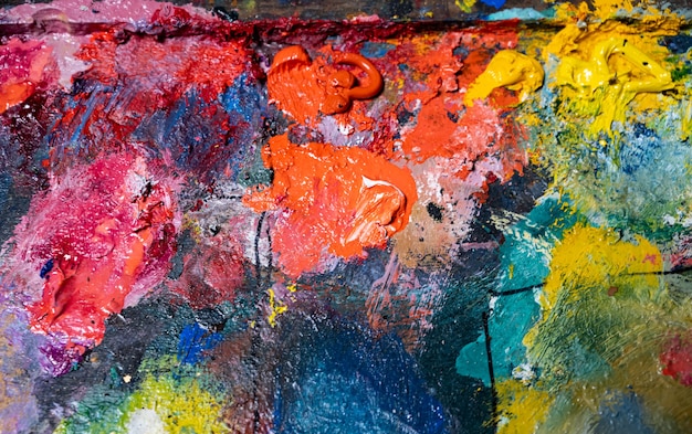 Background image of oil-paint palette. Closeup