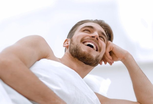 Background image of a successful man wakes up in a new\
house