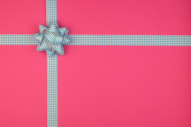 Фото Фон в розово-голубых тонах, имитирующий подарочную упаковку