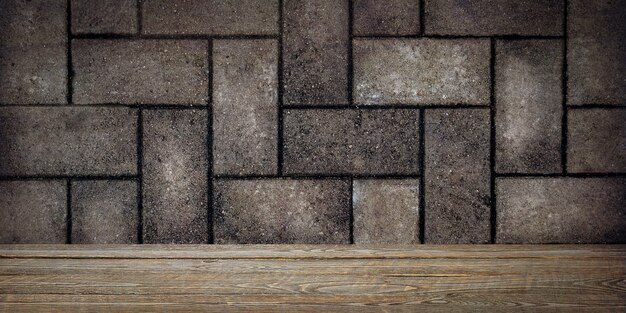 The background is blank wooden boards and a textured brick wall with lighting and vignetting