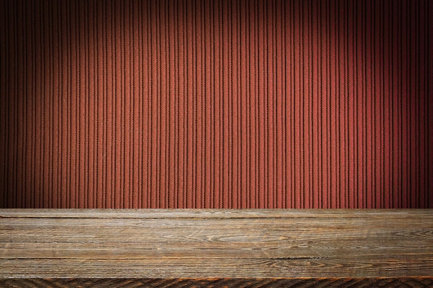 Photo the background is blank wooden boards and a textured striped wall with gradient lighting