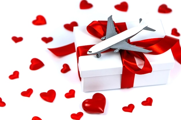 Background isolate with hearts and airplane. Valentine's Day. Selective focus.