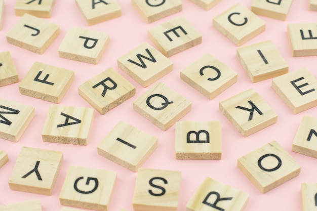 background of  letterpress wood type printing blocks, random letters of alphabet