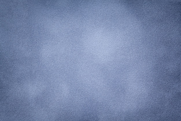 Background of light blue suede fabric closeup.