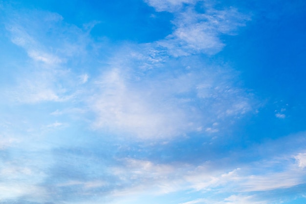 Background light cirrus clouds on blue sky