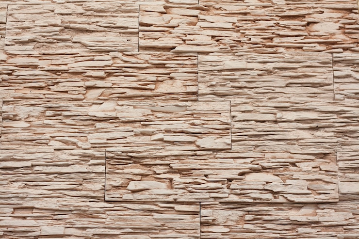Photo background of light pink rough-cut stones