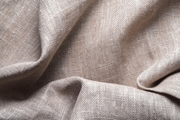 Background of linen napkin folded in folds