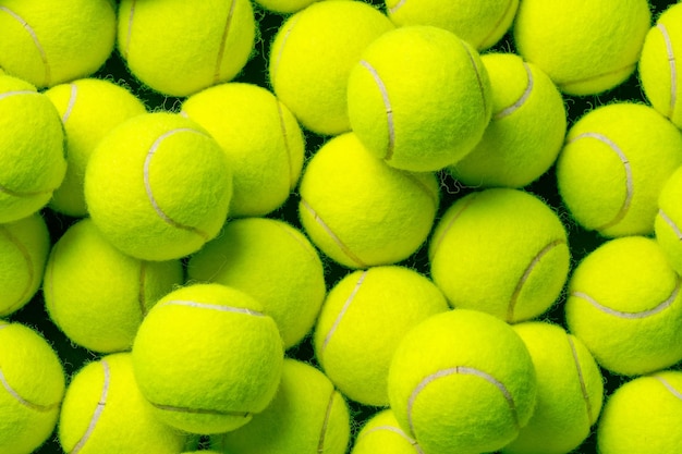 Photo background of lots of vibrant tennis balls