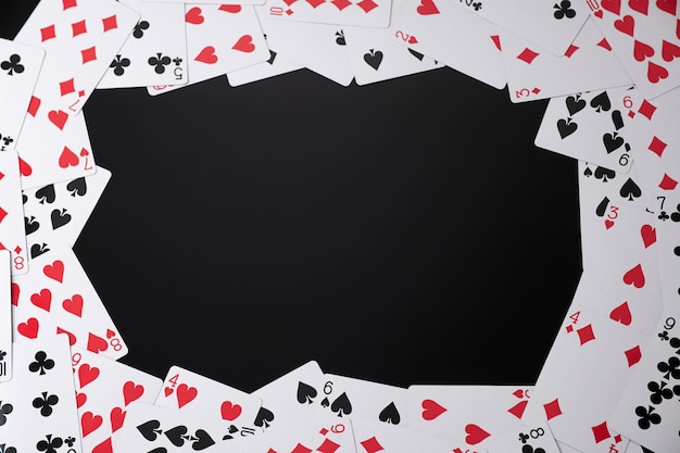 Photo background made of playing cards top down view